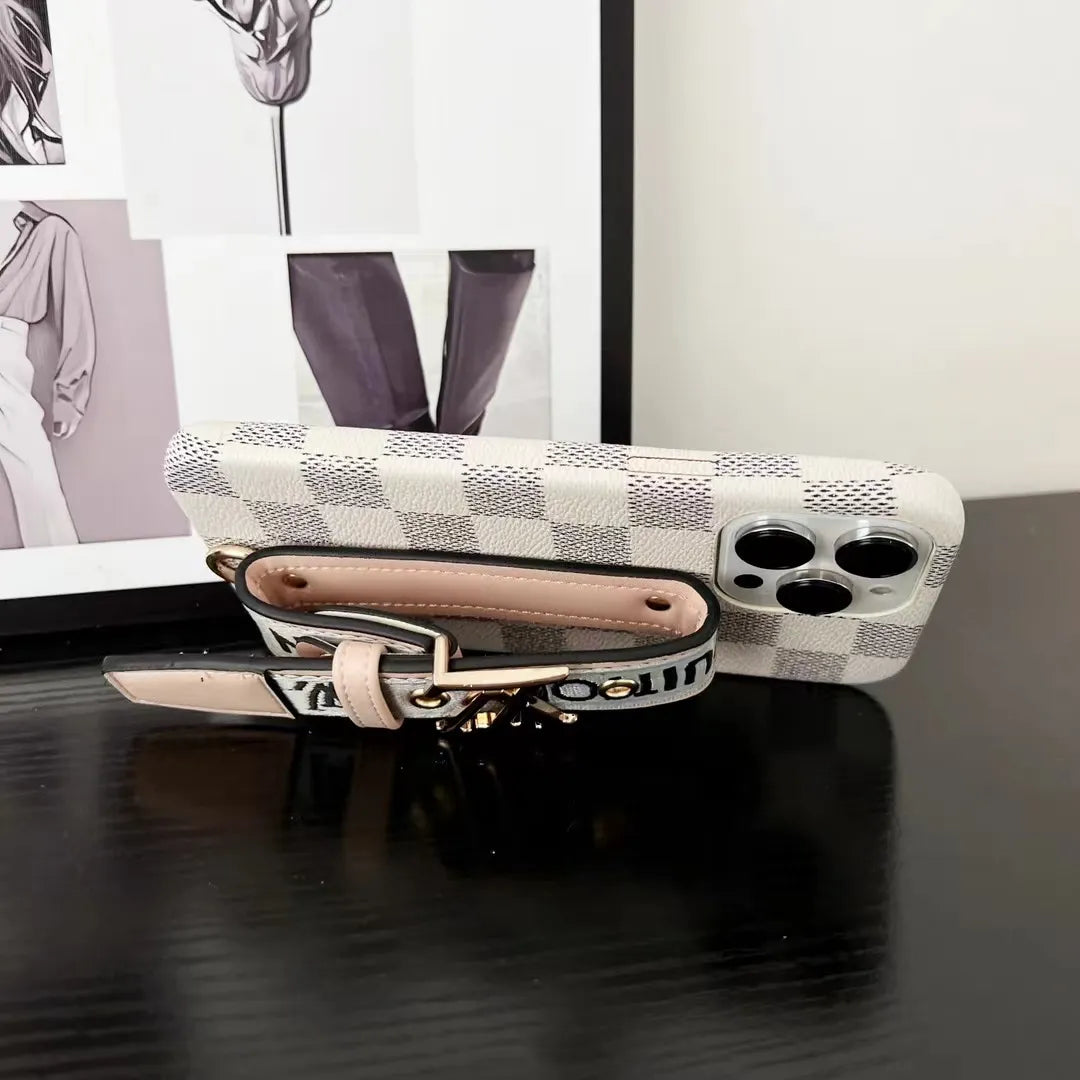 Louis Vuitton-inspired checkered phone case with hand strap for iPhone 16 Pro Max
