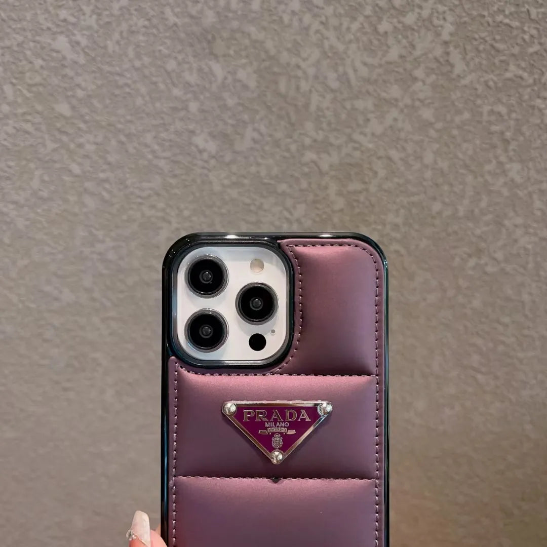 Prada-inspired panelled puffer case with triangle detail