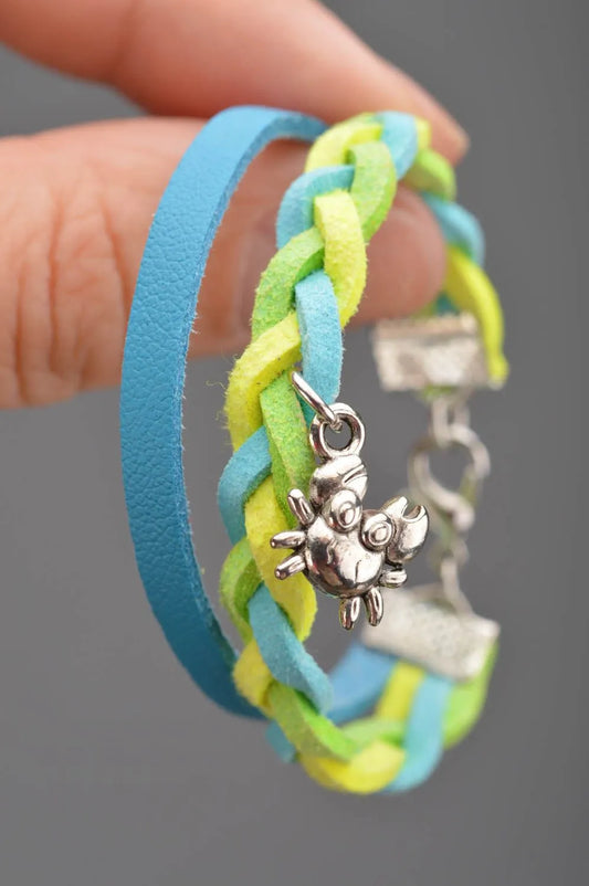 Handmade designer genuine leather cord wrist bracelet blue and yellow with charm