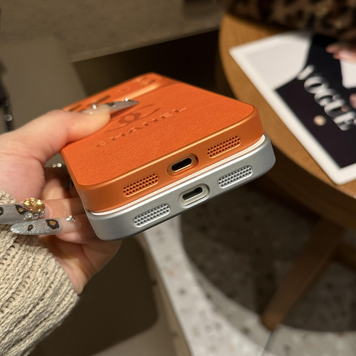 Chanel-inspired solid color iPhone case with embossed emblem