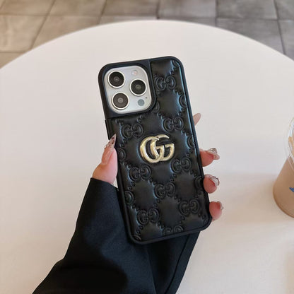 Gucci-inspired quilted iPhone case with metal emblem