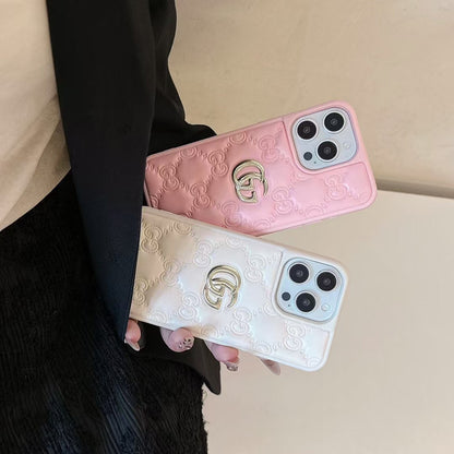 Gucci-inspired quilted iPhone case with metal emblem