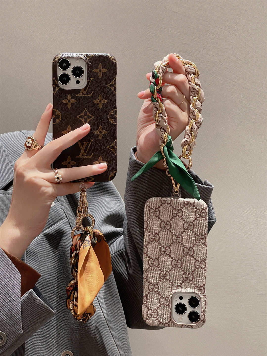 Louis Vuitton-inspired phone case with hand strap