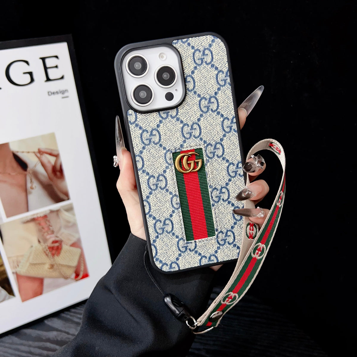 Gucci-inspired iPhone case with hand strap
