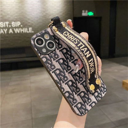 Dior-inspired patterned iPhone 13 case with strap
