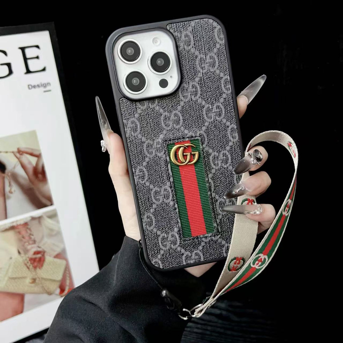 Gucci-inspired iPhone case with hand strap