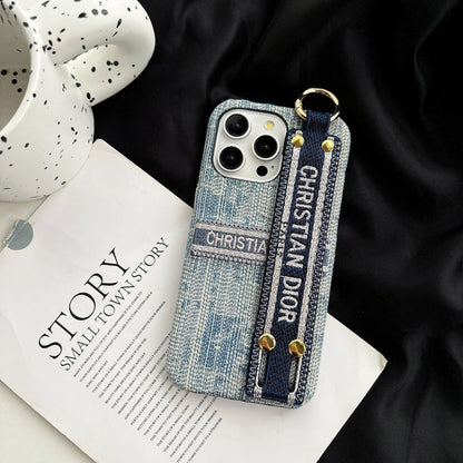 Dior-inspired patterned phone case with wide hand strap