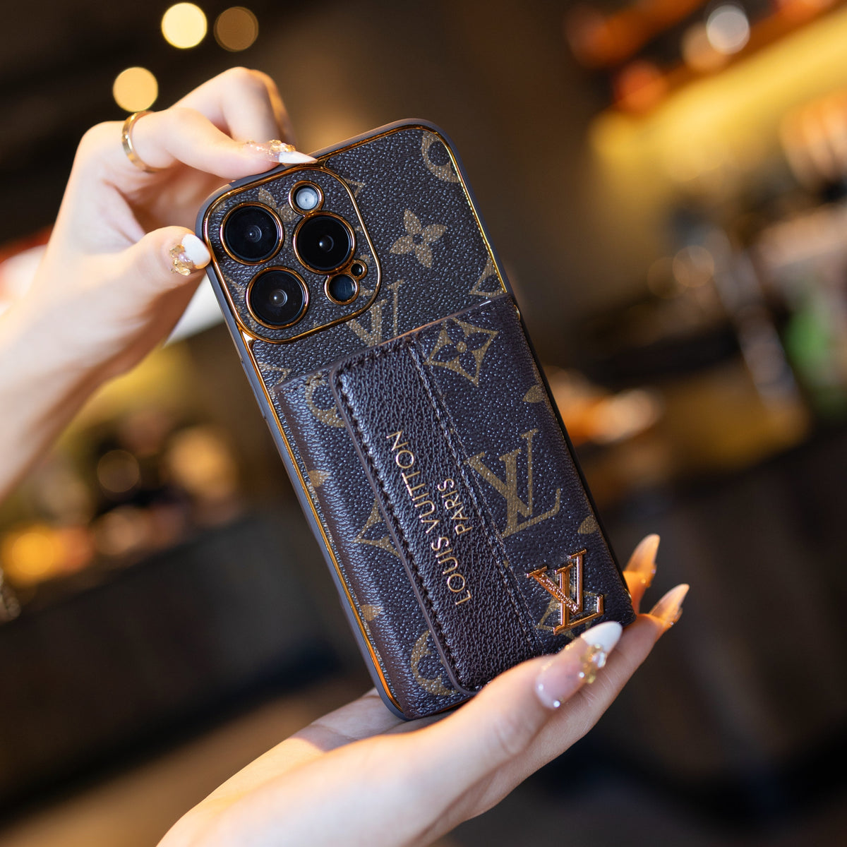 Louis Vuitton-inspired leather iPhone case with card holder and strap
