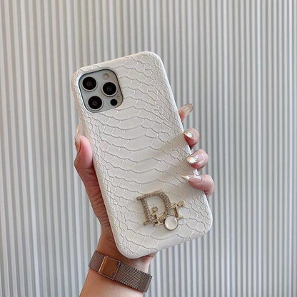 Dior-inspired snake texture iPhone case with emblem detail
