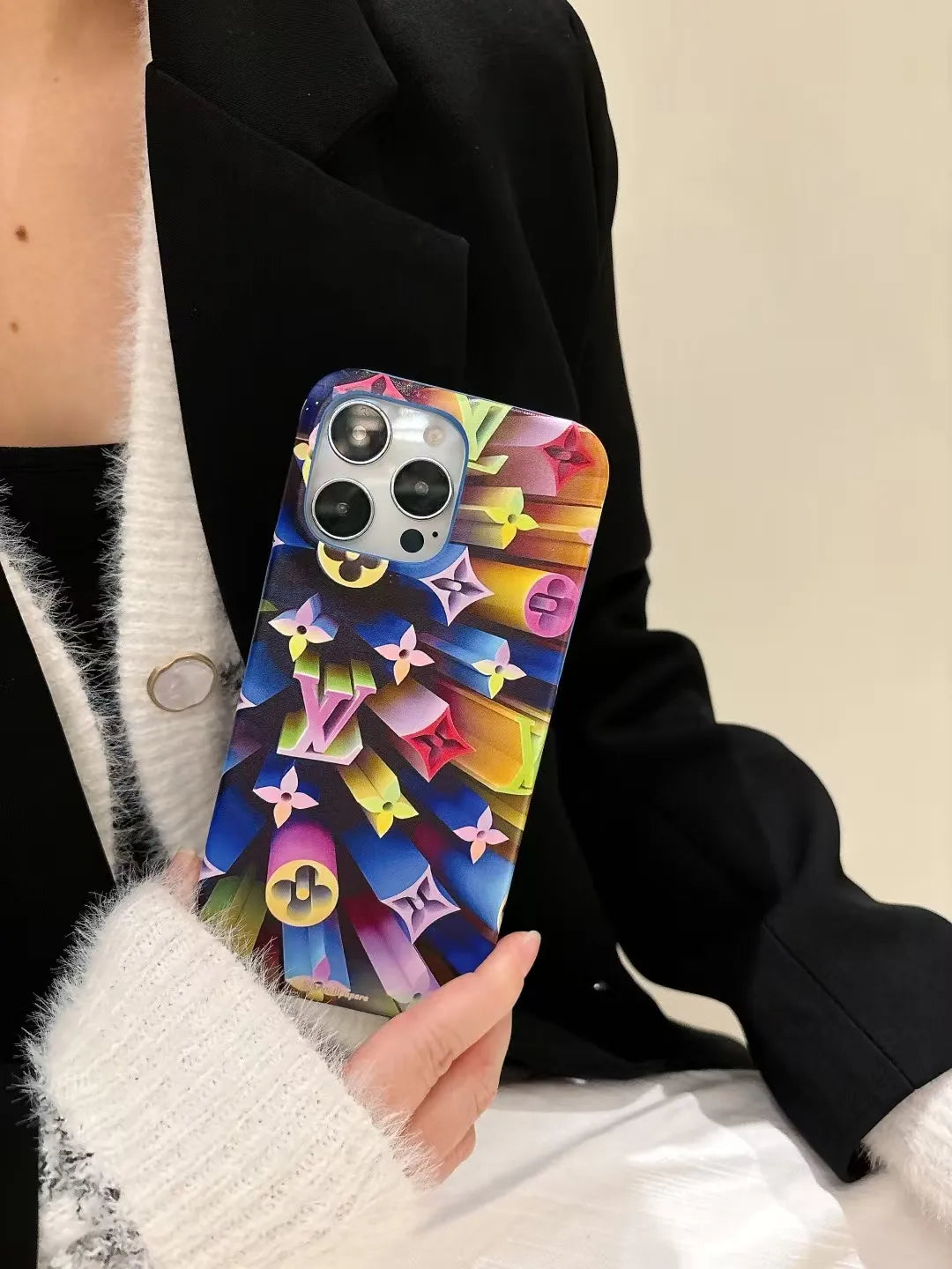 Louis Vuitton-inspired colorful character collage iPhone case