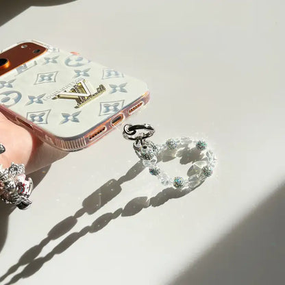 Louis Vuitton-inspired monogram phone case with hand chain