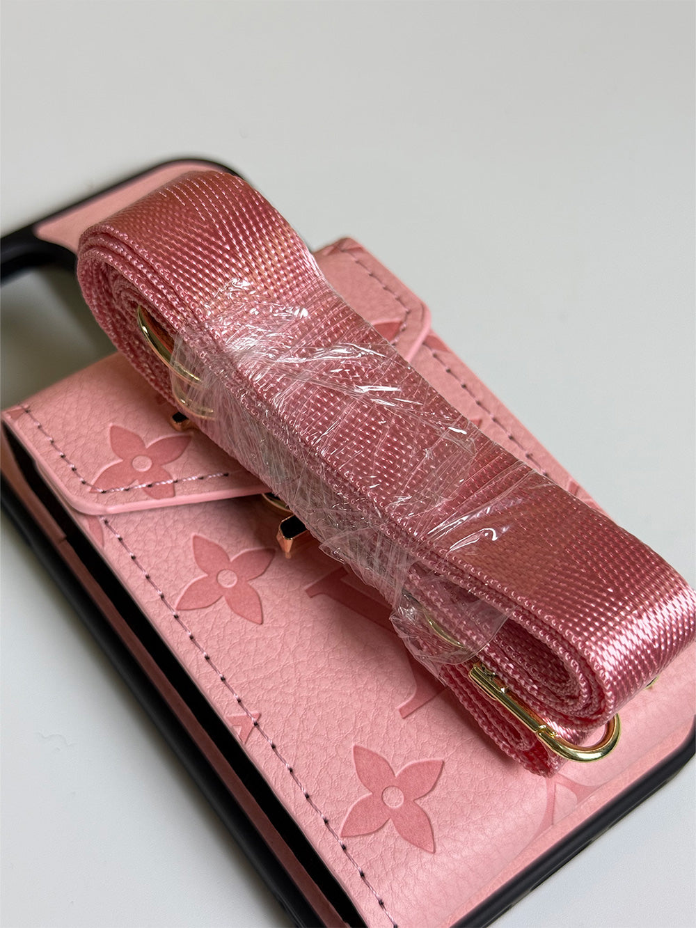 Louis Vuitton-inspired pink iPhone case with card holder