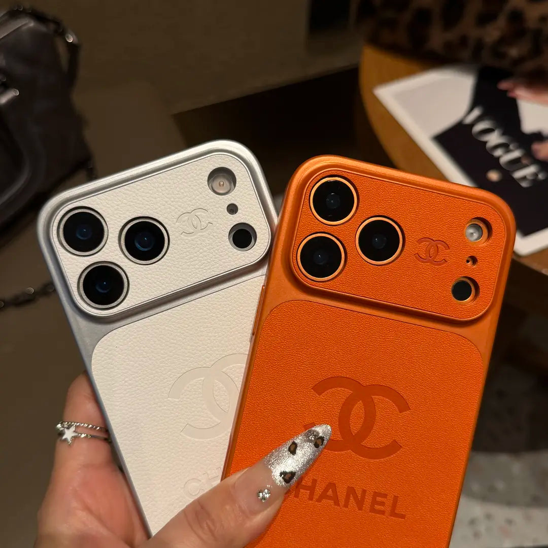 Chanel-inspired solid color iPhone case with embossed emblem