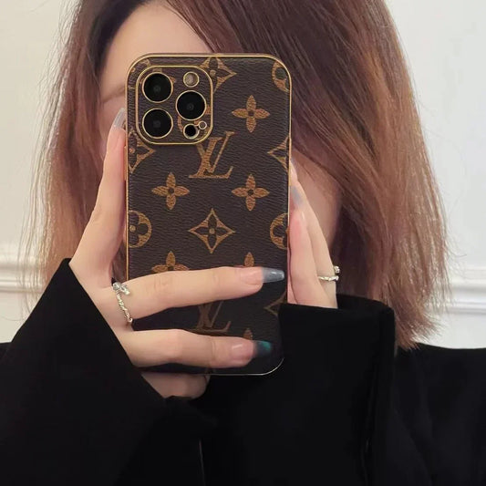 Louis Vuitton-inspired brown monogram iPhone case with emblem