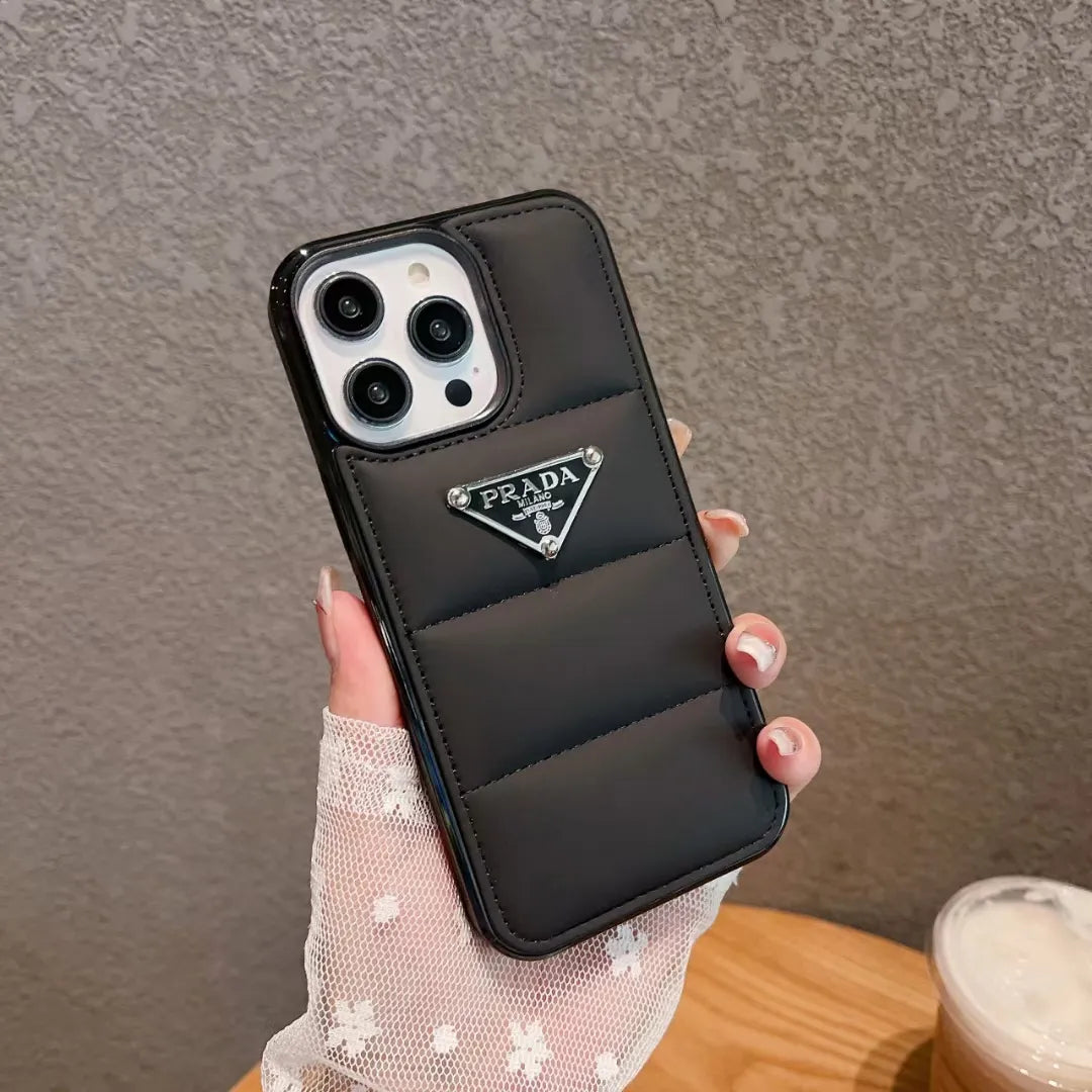 Prada-inspired panelled puffer case with triangle detail