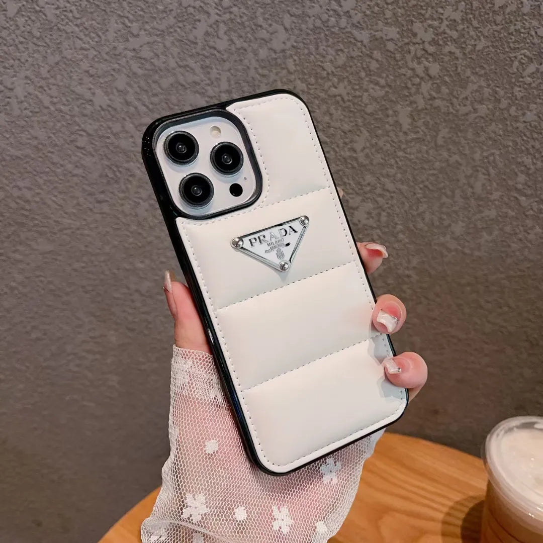 Prada-inspired panelled puffer case with triangle detail