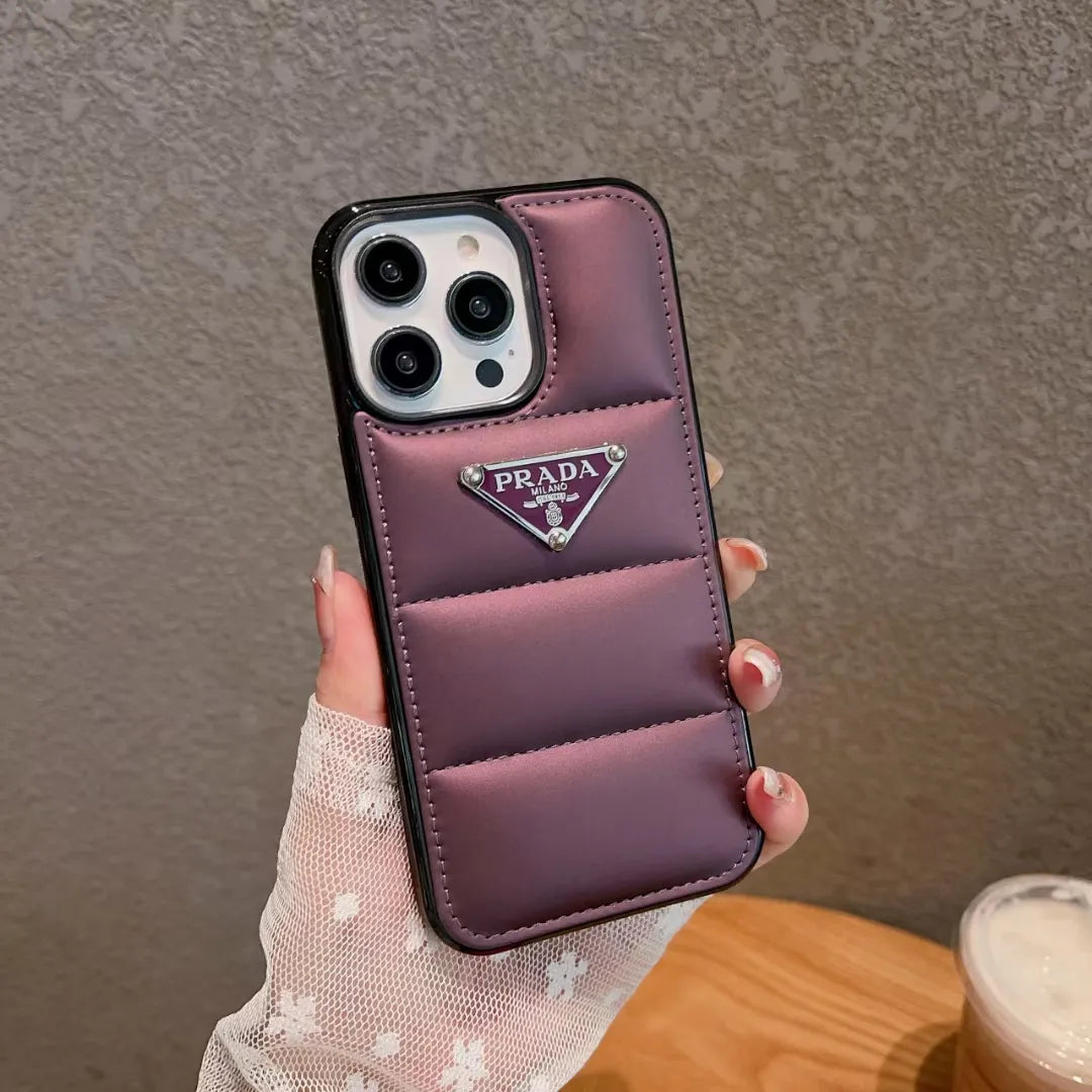 Prada-inspired panelled puffer case with triangle detail