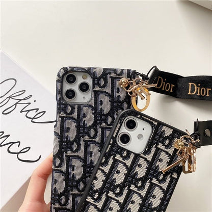 Dior-inspired all-over pattern phone case with hand strap