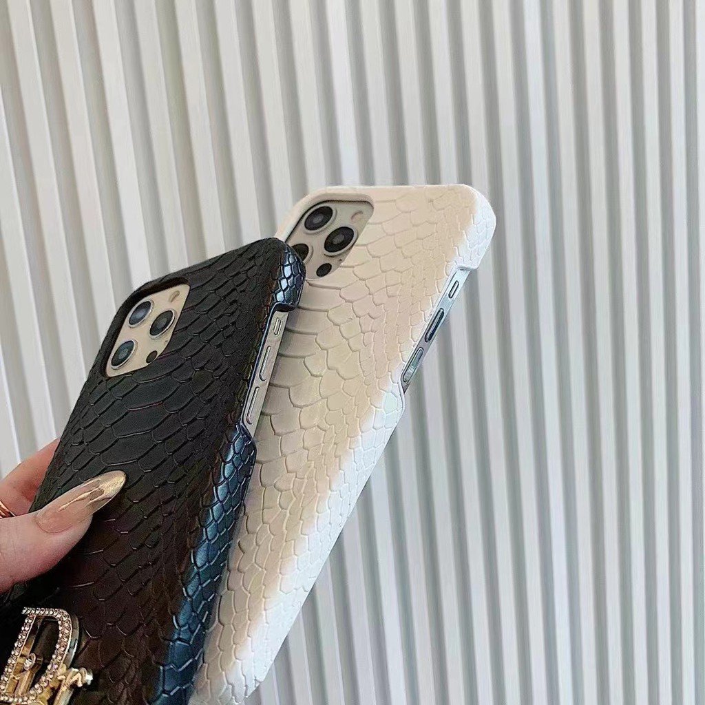 Dior-inspired snake texture iPhone case with emblem detail