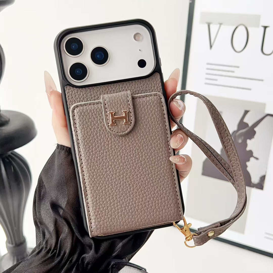 Hermes-inspired solid color iPhone 17 case with card holder and strap