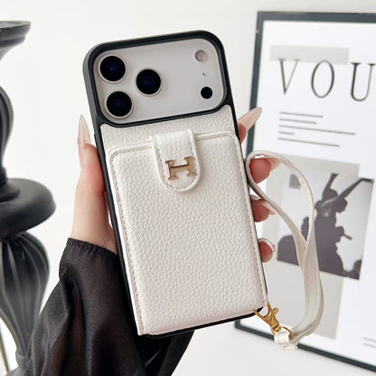 Hermes-inspired solid color iPhone 17 case with card holder and strap