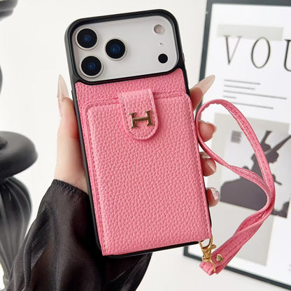 Hermes-inspired solid color iPhone 17 case with card holder and strap