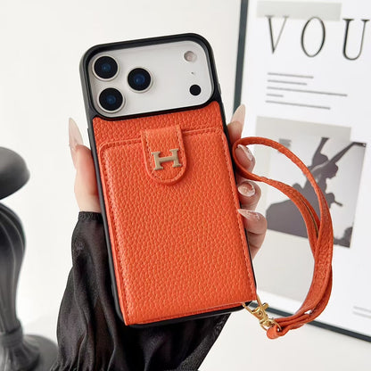 Hermes-inspired solid color iPhone 17 case with card holder and strap