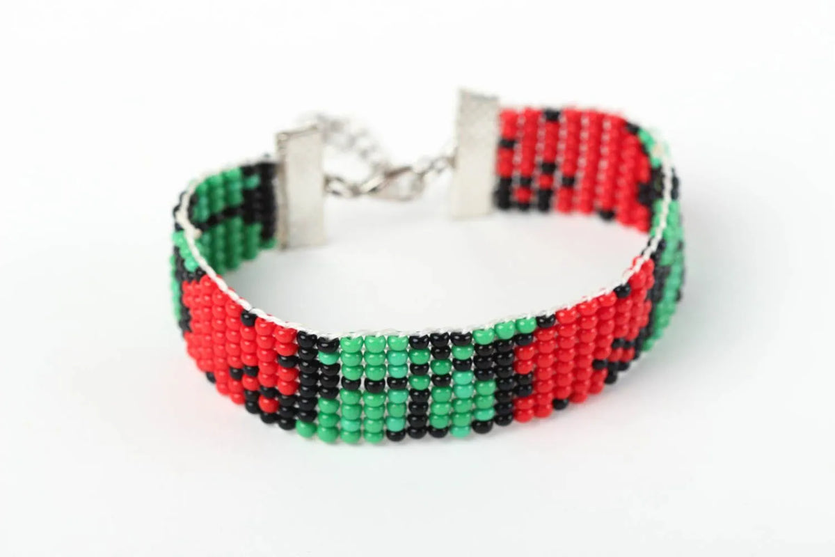 Adjustable green, black, red beads bracelet with floral ornament for her