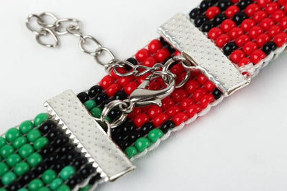 Adjustable green, black, red beads bracelet with floral ornament for her
