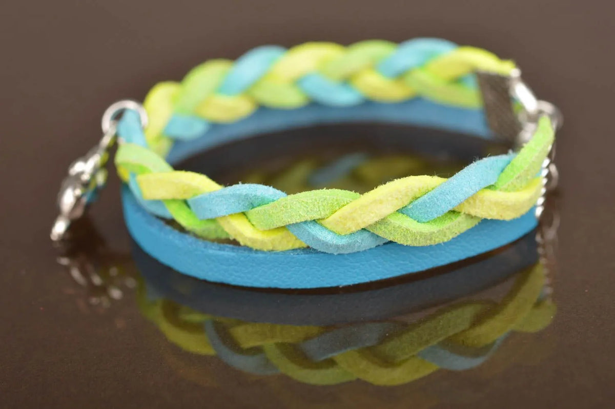Handmade designer genuine leather cord wrist bracelet blue and yellow with charm
