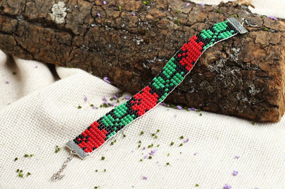 Adjustable green, black, red beads bracelet with floral ornament for her