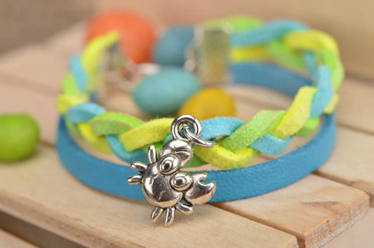 Handmade designer genuine leather cord wrist bracelet blue and yellow with charm