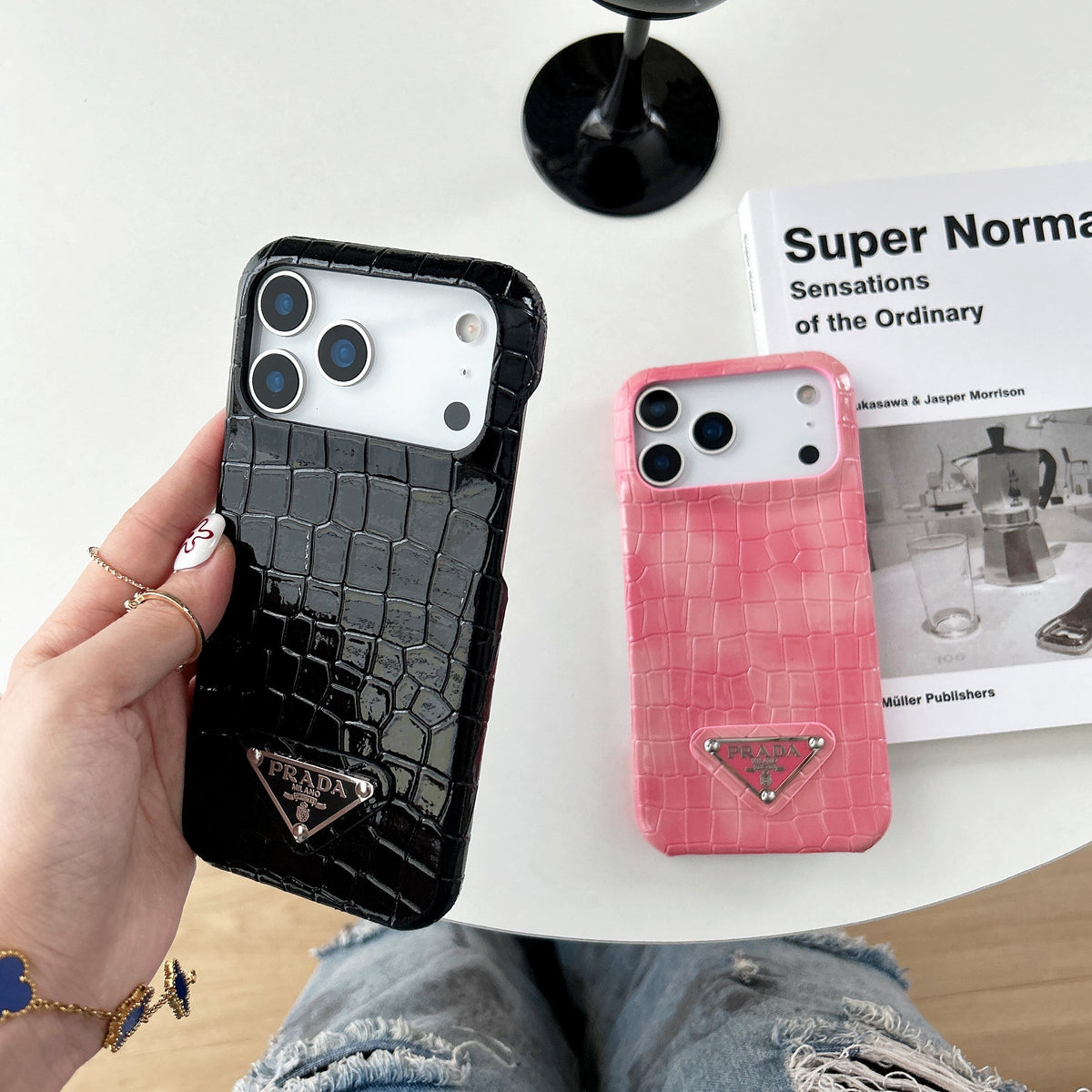 Prada-inspired pastel textured iPhone 17 case with triangle detail
