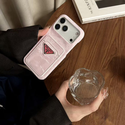 Prada-inspired iPhone 17 case with triangle card pocket