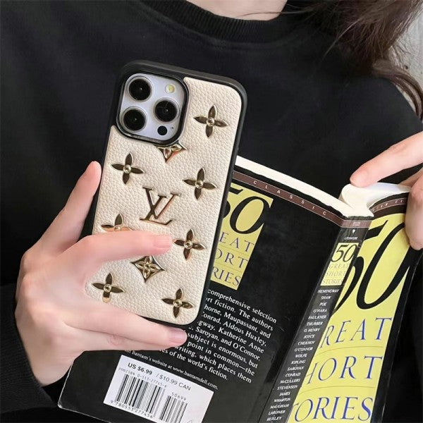 Louis Vuitton-inspired phone case with raised gold-tone pattern